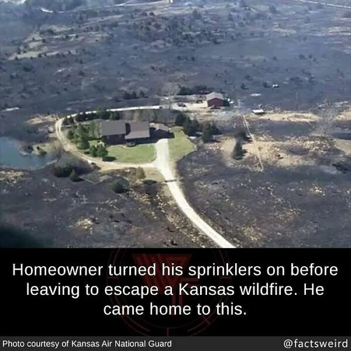 Aerial view of a Kansas home surrounded by scorched land after a wildfire, illustrating weird facts about the world.