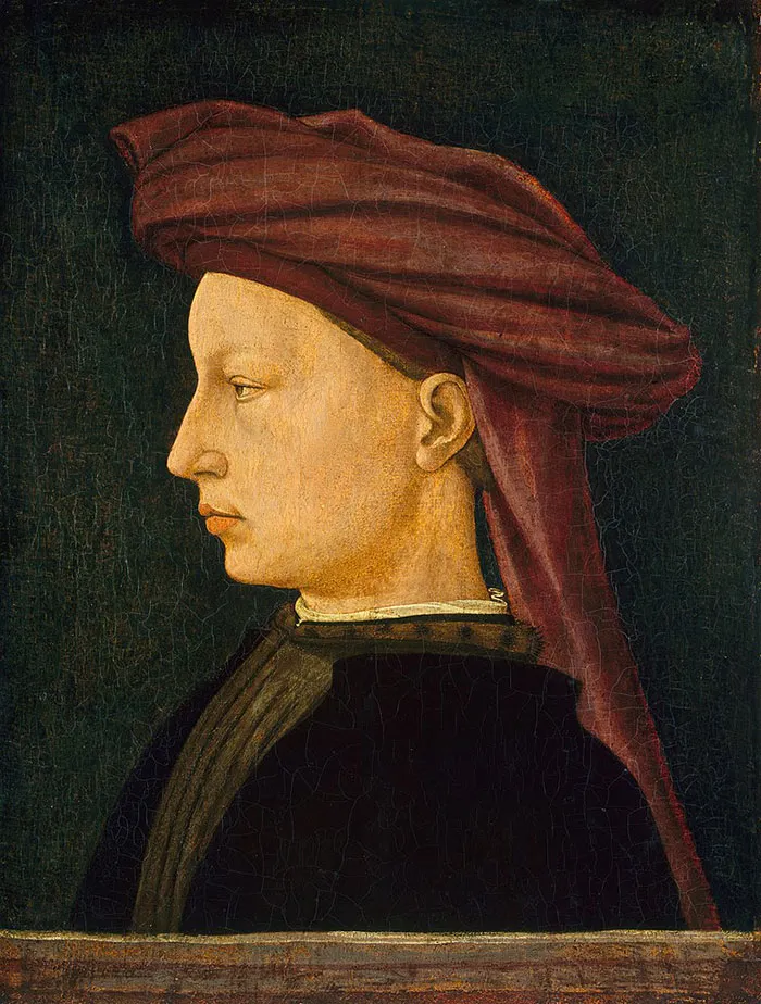 Portrait in profile with a red hat, exemplifying famous paintings in art history.