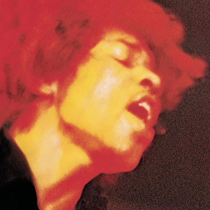 Iconic album cover with a blurred portrait of a singer in warm tones, symbolizing one of the greatest album covers ever.