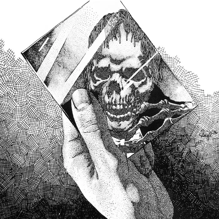 Hand holding a reflective album cover with a skeletal face design, featuring intricate black and white dot patterns.