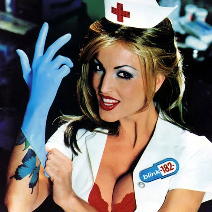 Nurse in white outfit with blue gloves, iconic album cover featuring 'blink-182' logo.