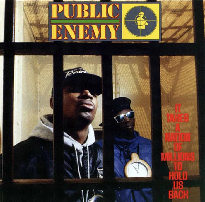 Public Enemy album cover featuring two men behind bars with bold typography.