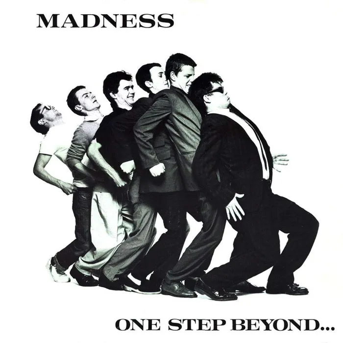 Iconic album cover of Madness, featuring band members leaning in a line, promoting the greatest album covers.