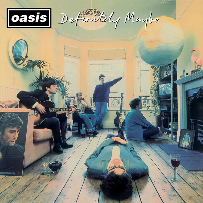 Greatest album covers: A room with people lounging, guitar, and globe, depicting the Oasis cover art.