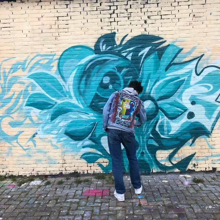 Artist At Work At The ‘Ijhallen’ In Amsterdam. If You’re In Amsterdam, You Have To Visit Ndsm!