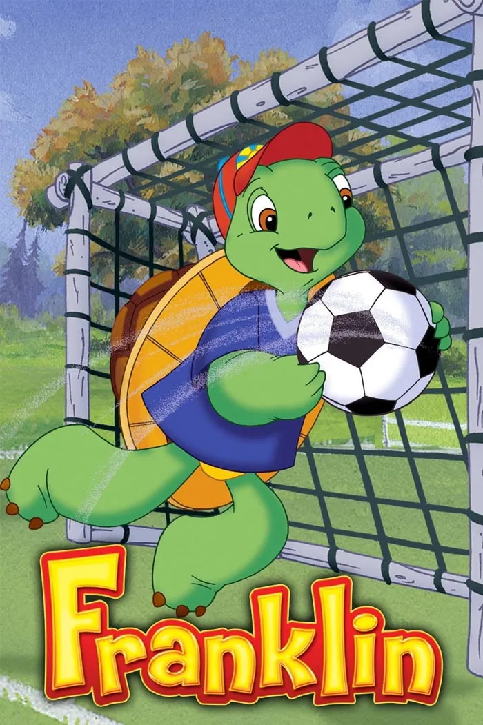 Cartoon turtle playing soccer in a goal net, wearing a red cap and blue jersey.
