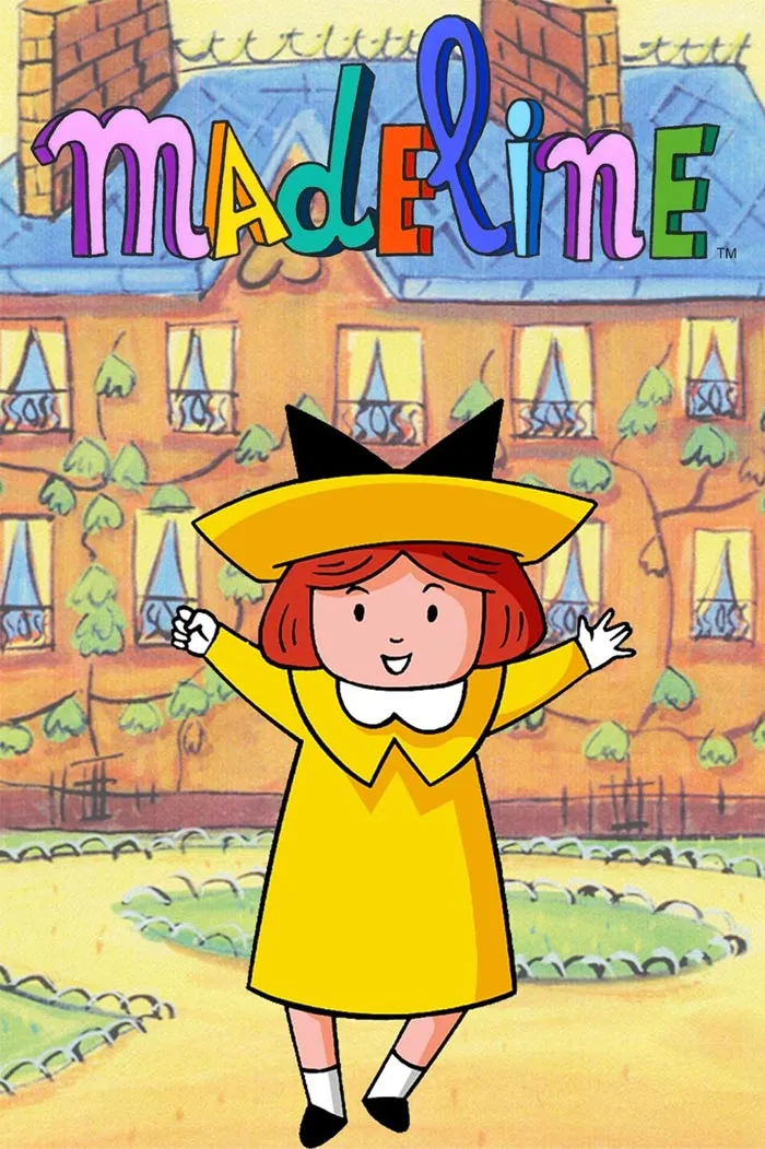 Cartoon character Madeline in a yellow dress and hat, smiling in front of a Parisian school building.