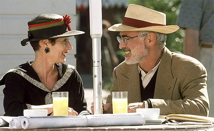 In The Truman Show (1998), The Couple At The Table Are Daryl Davis And Robert Davis, They Are The Founders Of Seaside, The Town Where The Movie Was Filmed. They Agreed To Give Filming Permission, In Return For A Cameo