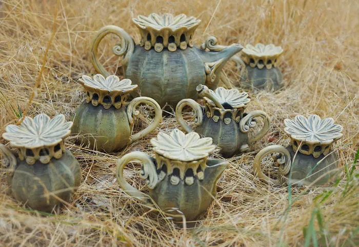 Poppy seedheads inspired this tea set. The cup lids come off and act as little plates for treats