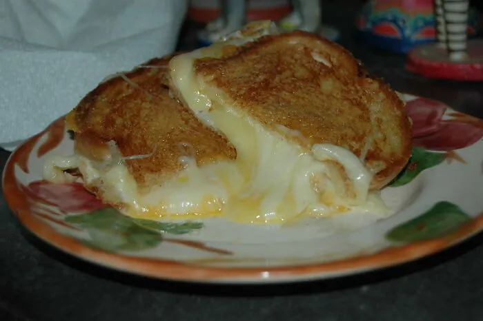 Eating Burnt Grilled Cheese Sandwich