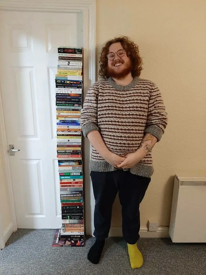 I Read 71 Books In 2021, Here Is A Photo Next To All Of Them, I Am 5'9" For Reference