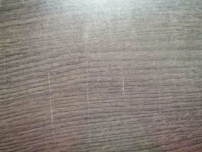 My Brother's Girlfriend Moved In With Us, And She Refuses To Use Cutting Boards. This Is What Our Kitchen Table Looks Like Now. They're All Over It