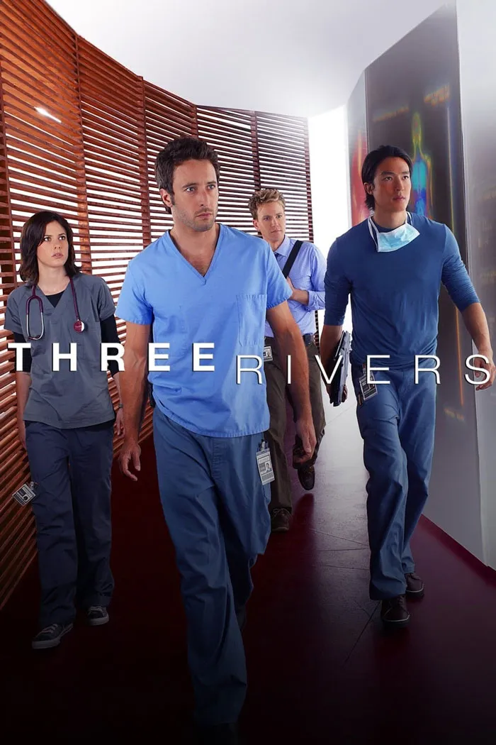 Doctors walking in hospital hallway, wearing scrubs, showcasing a medical TV show scene.