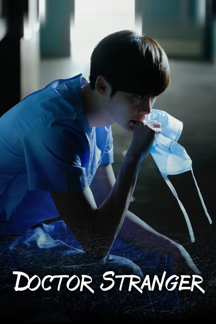 Doctor in scrubs holding a mask, representing TV shows about medical workers.