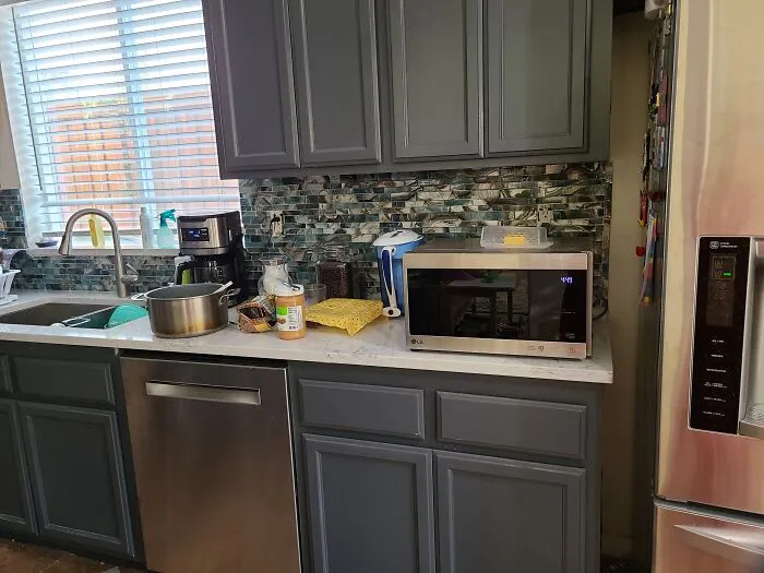 Kitchen - Remodeled Over The Summer.  Cabinets Painted And Backsplash Tile Installed By Me.  Had To Have Someone Set The New Countertops.