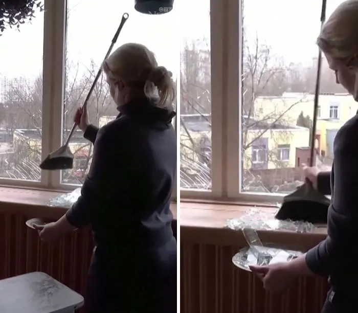 A Tearful Kyiv Resident Sings Ukraine's National Anthem As She Cleans Shattered Glass In Her Apartment