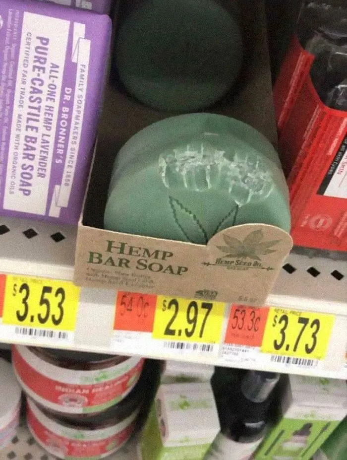 Green bar of soap with a bite mark 