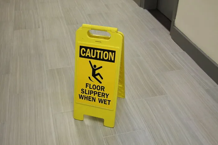 Put Wet Floor Signs Next To The 50 Shades Of Grey Display