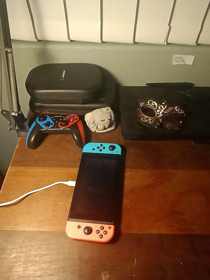 Nintendo, A Sock, My Drawing Pad (With Laptop Beneath) And A Mask (Randomly)