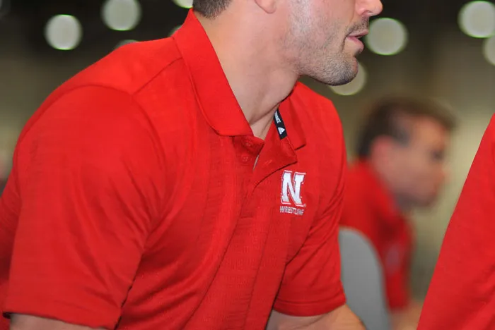 A Polo With Competitor's Logo On It