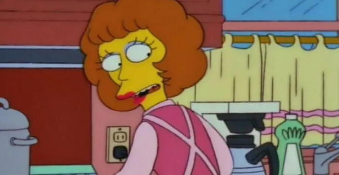 Woman character from The Simpsons in a kitchen setting, highlighting small details fans noticed about Homer in the show.