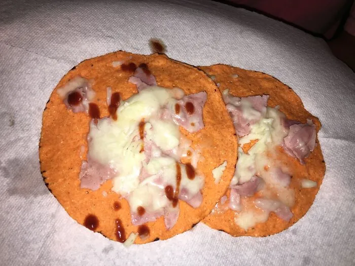 Pizza Hut Was Closed So My Boyfriend Made "Mini Pizzas". Tostadas, Mozzarella Cheese, Ham, And Sriracha.