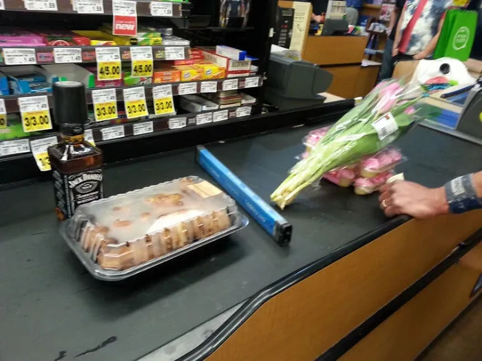 Two Very Different Valentine's Nights. 12 Piece Of Fried Chicken & Whiskey vs. 12 Pink Tulips & Cupcakes