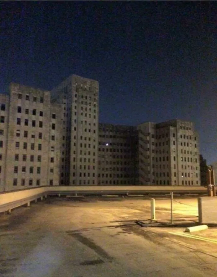 Just A Window Lit Up In An Abandoned Hospital