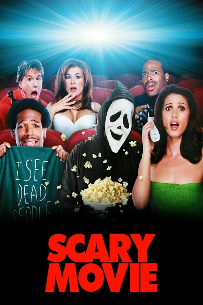 Group of shocked people including a masked figure holding popcorn in a horror comedy movie theater scene.