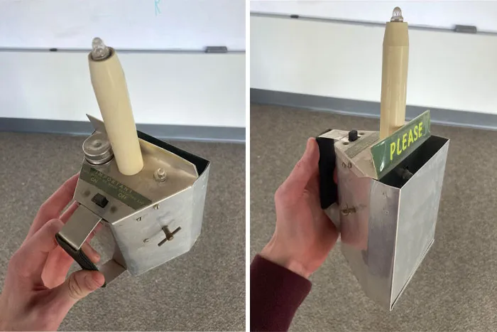 Found This Deep In My Church's Storage. Looks Like There's A Place For A Battery, Multiple Lights, And Even A Knob That Only Clicks When You Twist It. It Seems To Be From The 70s And Made Primarily Out Of Aluminum. All I Can Think Of Is It Was Some Sort Of Tithe Device, But It Doesn't Seem To Open