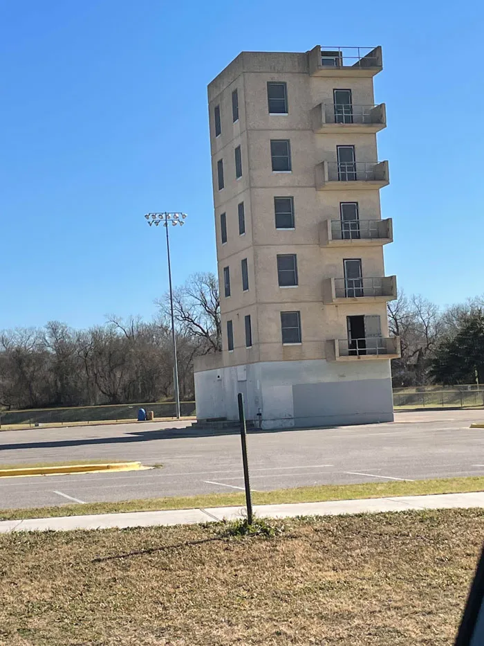 What Is This 6-Floor Tiny Tower In The Middle Of A Parking Lot, Adjacent A Baseball Field In East Austin, Tx?