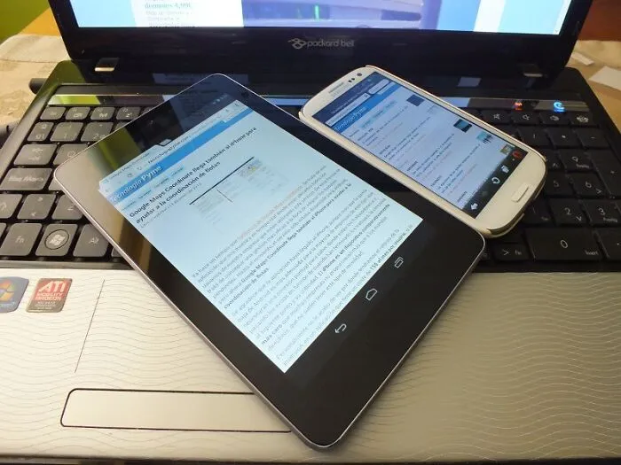 Two Laptops And A Tablet
