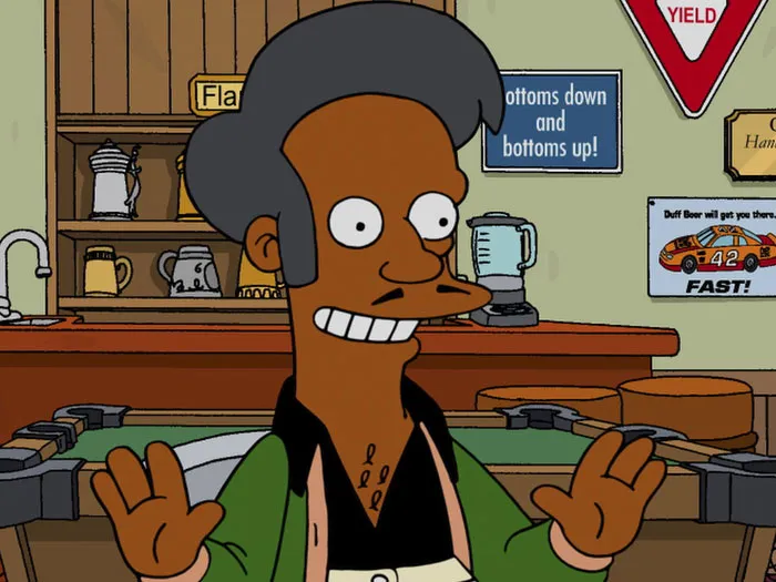 The Simpsons character Apu Nahasapeemapetilon is smiling