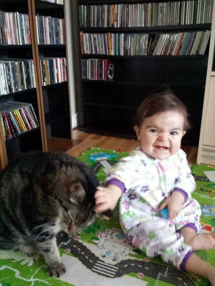 Just A Sweet Baby Girl With Her Kitty Cat