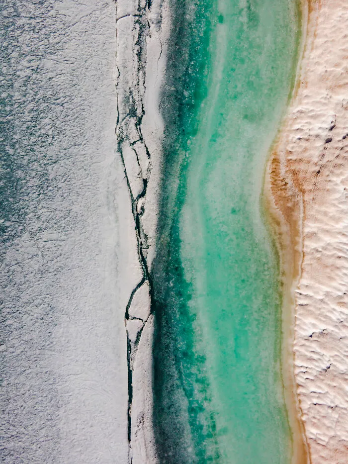 The Shore Of An Alpine Lake Beginning To Melt Out