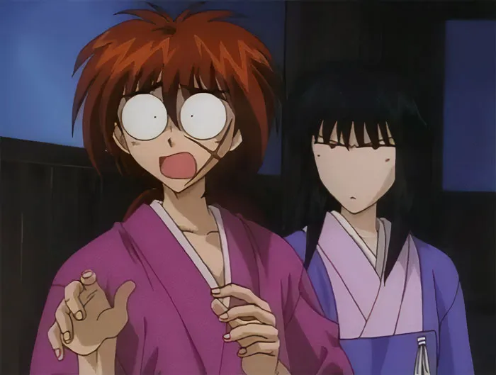 Two anime characters in traditional clothing, one with wide eyes, embodying a cute anime couple moment.