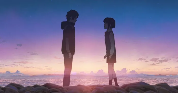 Cute anime couple standing together at sunset, symbolizing a heartfelt moment.