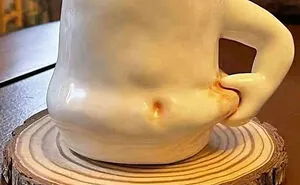 This Instagram Account Shares Pics Of Offensive, Dorky Or Bizarre Mugs That People Brought To Their Offices