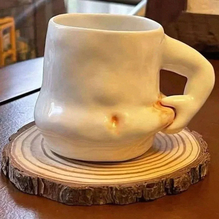 This Instagram Account Shares Pics Of Offensive, Dorky Or Bizarre Mugs That People Brought To Their Offices