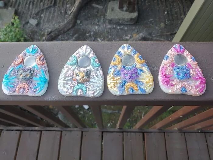These Aren't What Are Curing In My Molds Right Now, But I've Been Working On Cat Themed Resin Pieces.  I'm Hoping To Sell Some One Of These Days But Right Now I'm Having Fun With Colors.  These Also Serve As Reading Magnifiers.  I Also Make Boxes And Sun Catchers.  P.s. The Black Cat And The Calico Are Based On My Own Kitties.
