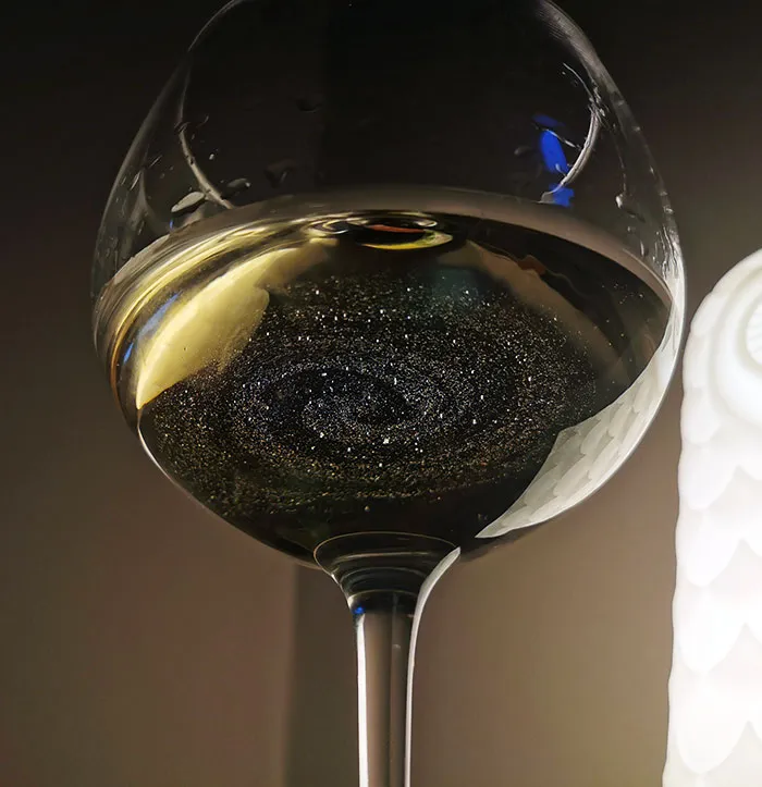 I Found Dust In My Wine Glass When I Set It Down Next To My Lamp. It Looks Like A Galaxy