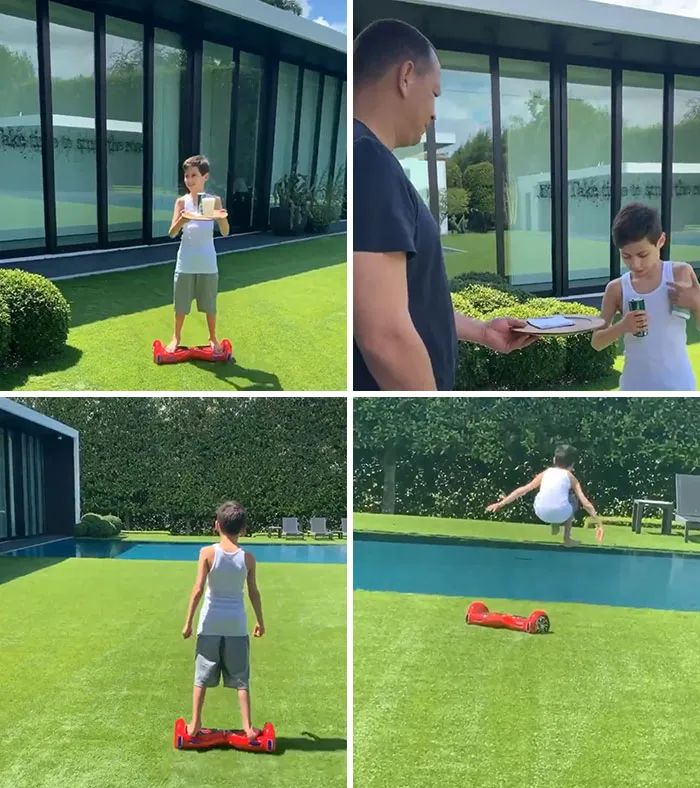 Child on hoverboard by pool, flaunting wealth with drink and phone at a luxurious home.
