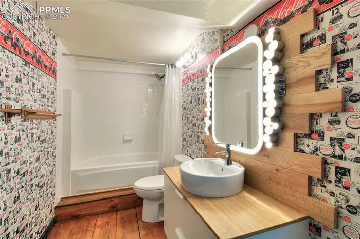 I’m Home Shaming A Place We Just Bought. I Present The Coca Cola Bathroom. The Floor Is Also Just Wood Boards Glued Directly To The Concrete. It’s…a Look.  Nothing In The Rest Of The House Even Remotely Resembles This. It’s Truly An Oddity