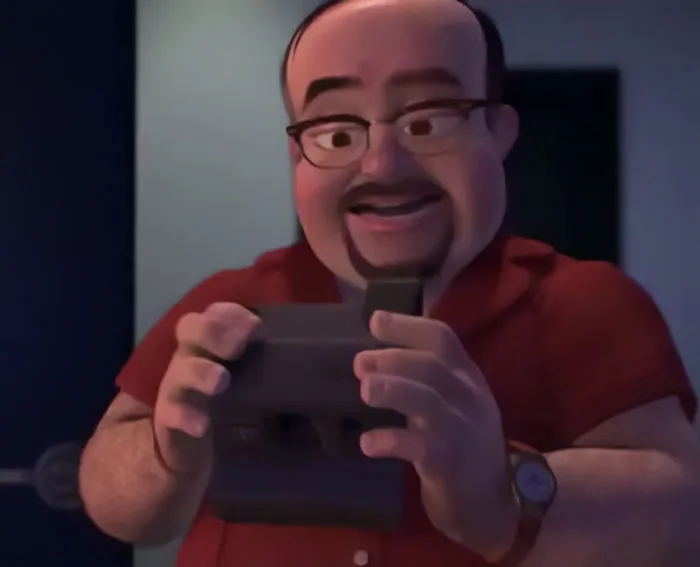 Al Mcwhiggin holding a camera 