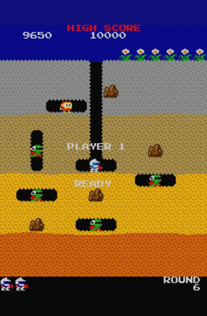 Retro video game gameplay screen showing a pixelated character navigating tunnels with enemies and scores displayed.