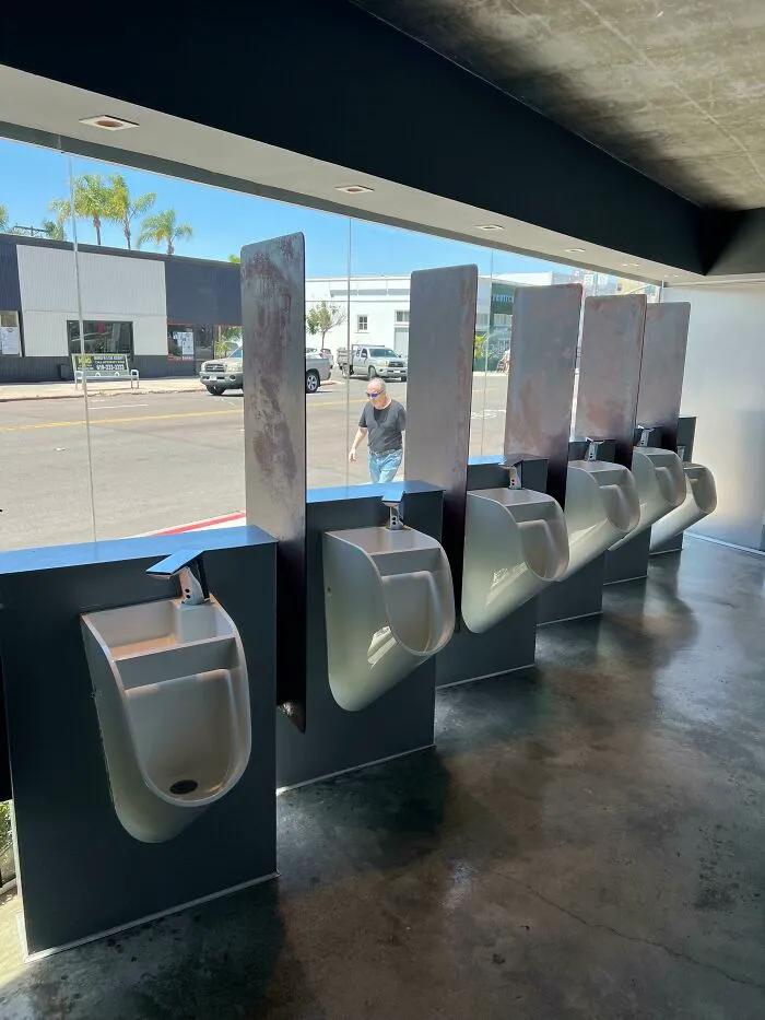 These Urinals Where You Can Look Out To The Street. Windows Aren’t Tinted At All So You Can Also See In. Even Has A Sink On Top Of Each One