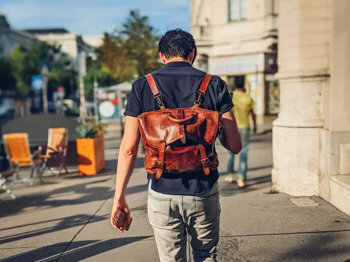 Searching For A Backpack, Eventually Realizing It Was On Their Back