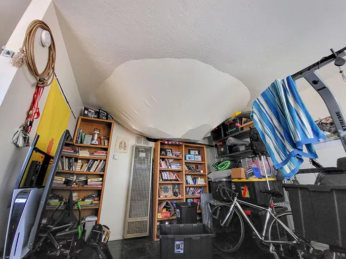 The Roof In My Apartment Collapsed Due To Rain, But The Latex Paint Caught The Drywall