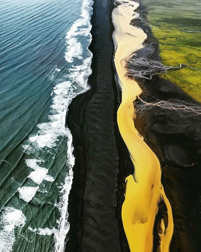 This Is A Place In Iceland Where Green Fields, Yellow River, Black Beach And Blue Sea Meet!