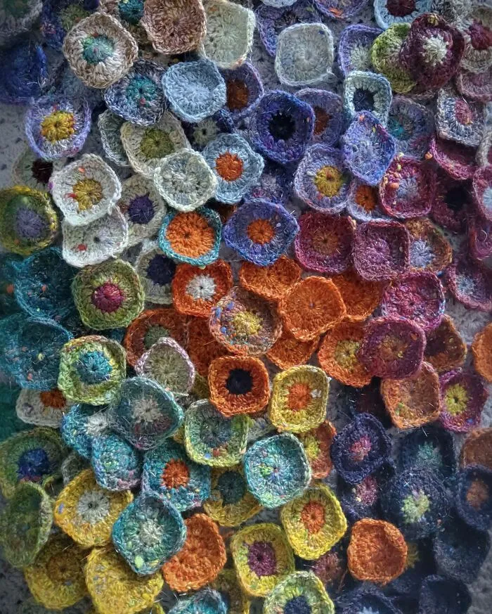 Lot And Lots Of Tiny Handspun Crochet Squares That'll Eventually Become A Blanket